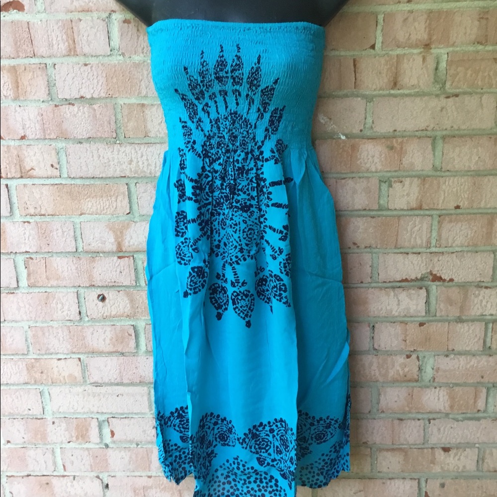 Turquoise strapless dress with mandala design